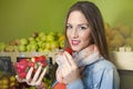 Young girl holding strawberries punnet