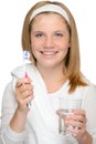 Young girl holding toothbrush glass water brushing Royalty Free Stock Photo