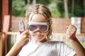 Girl Holding Toy Pliers