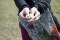 Young girl holding white flowers closeup