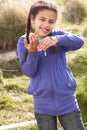 Young Girl Holding Worm Outdoors Royalty Free Stock Photo
