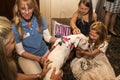 Young girl holds dog from pet rescue