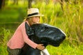 Young girl hugging a dog sculpture