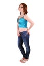 The young girl in jeans and blue top. Royalty Free Stock Photo