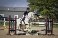 Young Girl Jumping Grey Pony Royalty Free Stock Photo