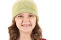 Young girl in knit hat missing one tooth Royalty Free Stock Photo