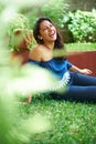 Young girl laugh on grass