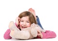 Young girl laughing with teddy bear