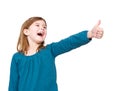 Young girl laughing with thumbs up Royalty Free Stock Photo