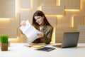 A young girl lawyer reads a court notice at the workplace