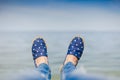 Young girl laying near the sea and resting Royalty Free Stock Photo