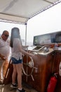 Young girl learns to sail a boat