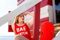 Young girl lifeguard keeps order on the water. summer concept