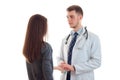 A young girl with long hair gives a hand doctor smock