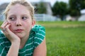 Young girl looking bored