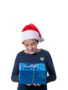 Young girl looking at a christmas present Royalty Free Stock Photo