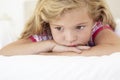 Young Girl Looking Sad On Bed In Bedroom Royalty Free Stock Photo