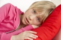 Young Girl Looking Sad On Sofa Royalty Free Stock Photo