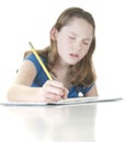 Young girl looking stressed with school work