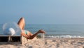 Young girl lying on a beach lounger Royalty Free Stock Photo