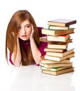 Young girl is lying on a floor and reading book Royalty Free Stock Photo