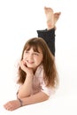 Young Girl Lying On Stomach In Studio Royalty Free Stock Photo