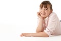 Young Girl Lying On Stomach In Studio Royalty Free Stock Photo