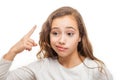 Young girl making an are you crazy gesture isolated Royalty Free Stock Photo