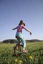 Young girl on monocycle Royalty Free Stock Photo