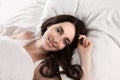 Young girl in the morning,lying in bed sleeping after hard work Royalty Free Stock Photo