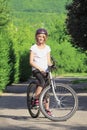 Young girl mountain biking Royalty Free Stock Photo