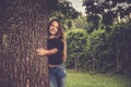 young girl near tree posing Royalty Free Stock Photo