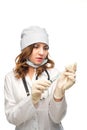 Young girl nurse in glasses prepares syringe Royalty Free Stock Photo