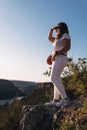 Young girl observing on top of a rock the nature of the Natural Park Hoces del RÃÂ­o DuratÃÂ³n located in Segovia in Spain Royalty Free Stock Photo