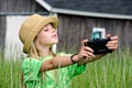 Young girl with old camera Royalty Free Stock Photo