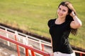 Young girl in old fotball stadium