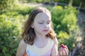 Young girl in orchard