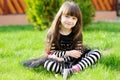 Young girl outdoors in witch costume on Halloween Royalty Free Stock Photo
