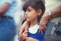 Young girl with parent