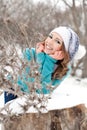 Young girl in a park on the snow