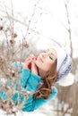 Young girl in a park on the snow