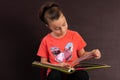 Young Girl with Photo Book Journal