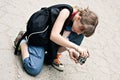 Young girl photographer taking photo Royalty Free Stock Photo