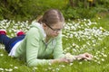 Young girl picking daisies Royalty Free Stock Photo