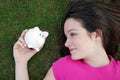 young girl with piggybank