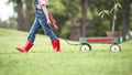 Young girl planting tree in park eco-aware Royalty Free Stock Photo