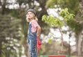 Young girl planting tree in park eco-aware Royalty Free Stock Photo