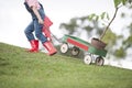 Young girl planting tree in park eco-aware Royalty Free Stock Photo