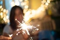 Young girl play a sparkle stick firework Royalty Free Stock Photo