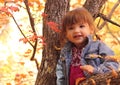 Young Girl Playing in Autumn Tree Royalty Free Stock Photo